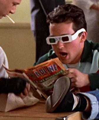 3-D reads a comic